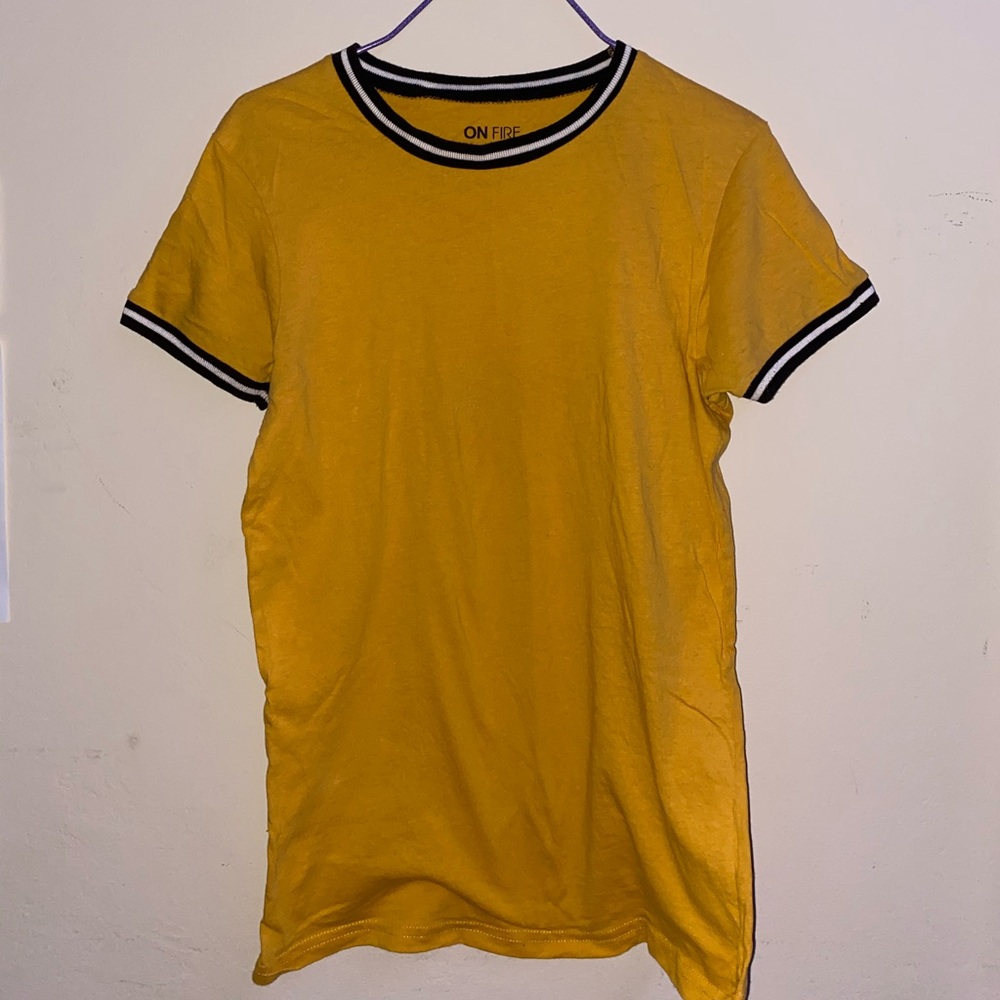 yellow tee w black and white stripe on the sleeves